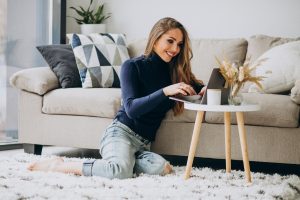 business woman working laptop home min